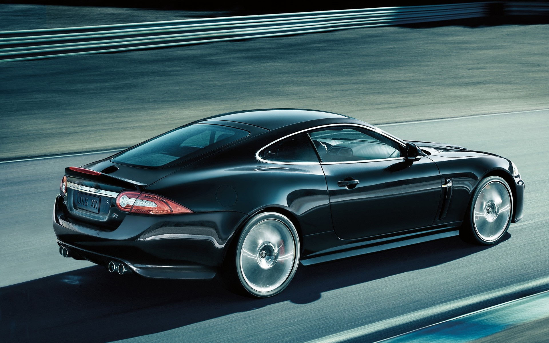 jaguar автомобіль автомобіль автомобільна швидко купе транспортна система асфальт колеса поспішайте тротуар диск чорнушка седан капот показати швидкість ягуар і передовими технологіями