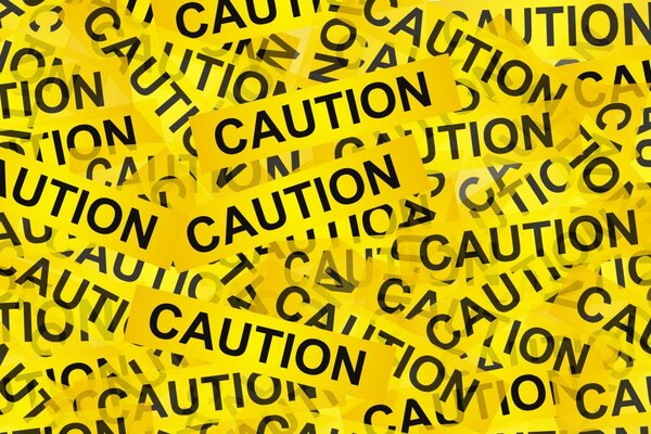Текст «Caution по всьому екрану