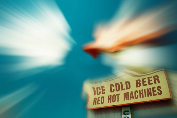 Напис на тлі рвзмитого неба