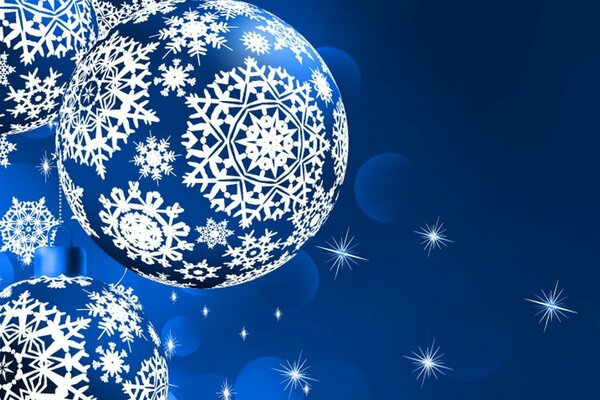 Новорічні іграшки розписані сніжинками