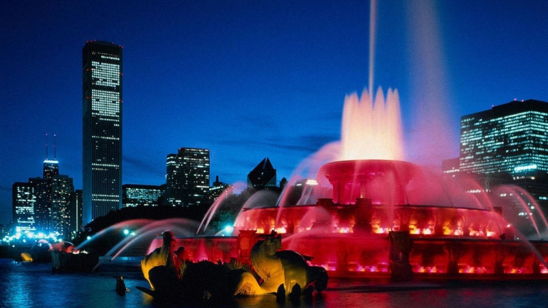 місто центр міста хмарочос місто ввечері сутінки подорожі скайлайн архітектура будинок міський світло вулиця захід міст води відображення підсвічуванням річка небо