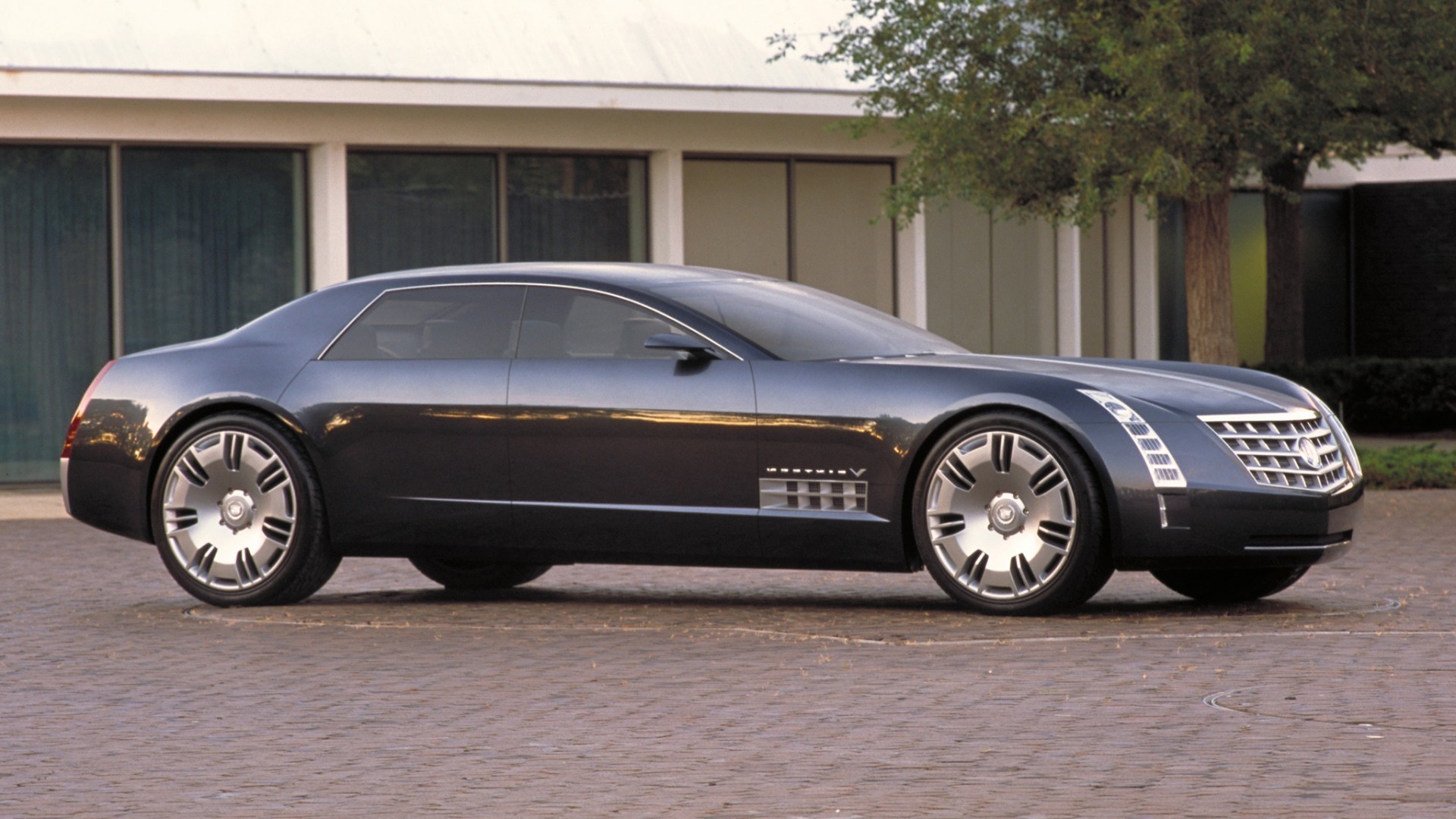 автомобіль автомобіль полудень колеса чорнушка тротуар асфальт транспортна система автомобільна купе дія